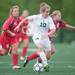 Father Gabriel Richard's Ellery Sarosi drives the ball up field during the first half of the regional semifinal game, Wednesday, May 29.
Courtney Sacco I AnnArbor.com  